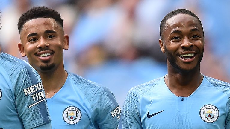 Raheem Sterling (R) celebrates with Gabriel Jesus 