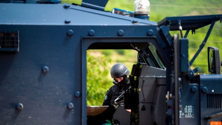A member of the Kosovo Police Special Unit during the raid in the north of the country