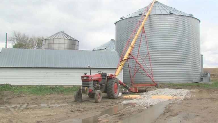 Mr Kaser got his leg stuck in this red grain auger. Pic: ABC News