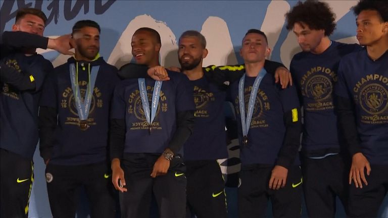 Man City stars including Raheem Sterling, centre left, and Sergio Aguero, centre right, gathered on stage