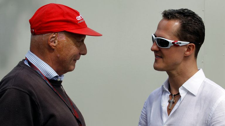 Lauda with fellow F1 legend Michael Schumacher in 2010