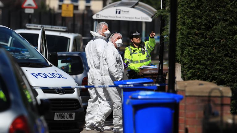 Forensics officers at the scene in Sheffield