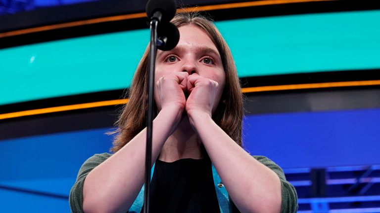Erin Howard, 14, reacts to hearing her final word in the final round 