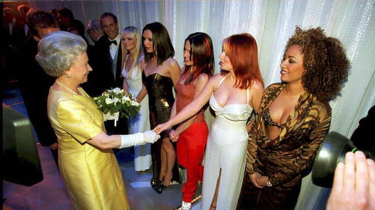 The Queen meets the The Spice Girls after the Royal Variety Performance in the Victoria Palace Theatre in 1997. 
