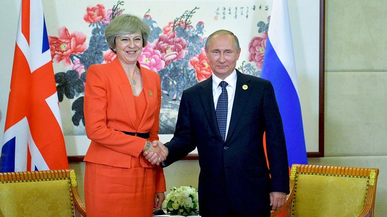 Theresa May and Vladimir Putin shake hands on the sidelines of a G20 summit in Hangzhou, China, in 2016