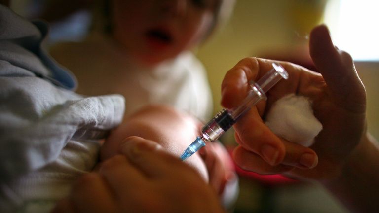 GLASGOW, UNITED KINGDOM - SEPTEMBER 03: A young boy receives a immunization jab at a health centre in Glasgow September 3, 2007 in Glasgow, Scotland. Medical experts still believe the MMR jab is safe and that the vaccine does not cause autism. (Photo by Jeff J Mitchell/Getty Images)
