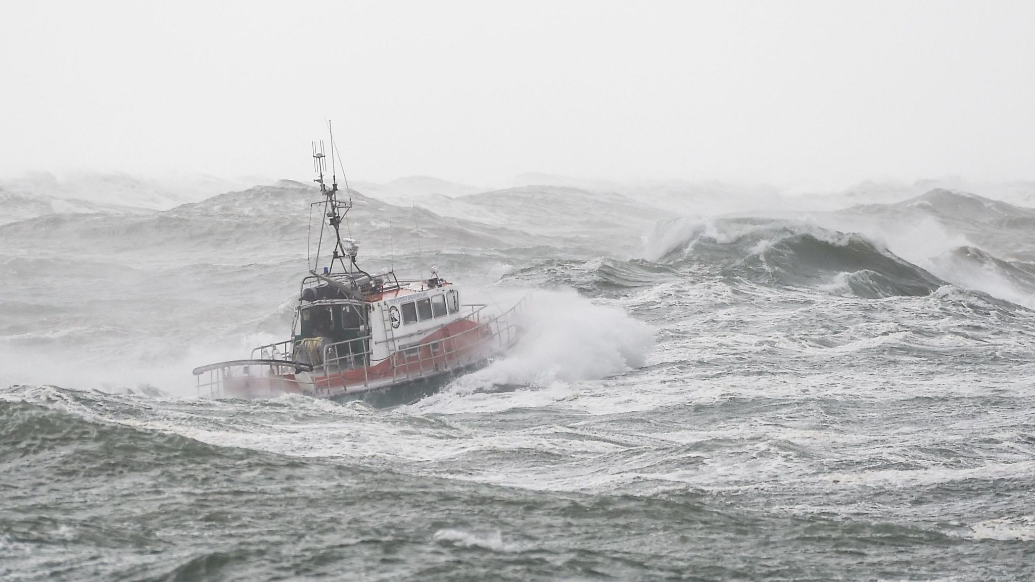 Three dead after rescue boat overturns as Storm Miguel