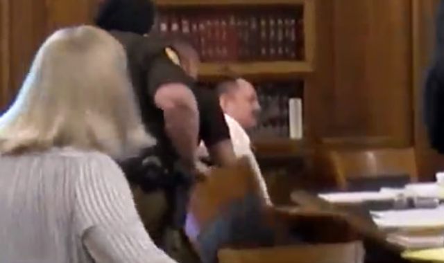 Aubrey Trail: Murder suspect slashes own throat during trial