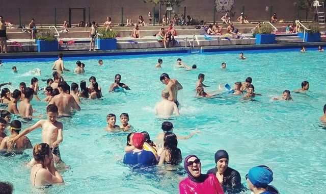 Muslim women 'inspired by Rosa Parks' defy burkini ban at French pool