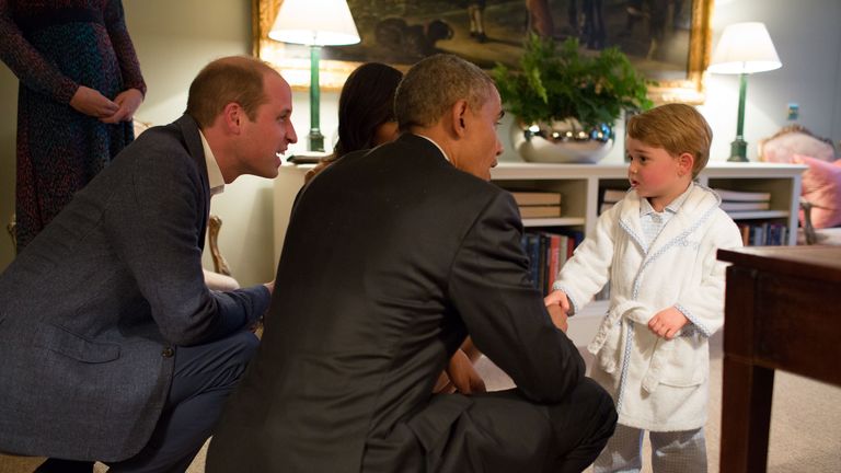 LONDON, ENGLAND - APRIL 22:   In this handout provided by The White House, President Barack Obama, Prince William, Duke of Cambridge and First Lady Michelle Obama talks with Prince George at Kensington Palace on April 22, 2016 in London, England. The President and his wife are currently on a brief visit to the UK where they attended lunch with HM Queen Elizabeth II at Windsor Castle and later dinner with Prince William and his wife Catherine, Duchess of Cambridge at Kensington Palace. Mr Obama visited 10 Downing Street this afternoon and held a joint press conference with British Prime Minister David Cameron where he stated his case for the UK to remain inside the European Union. (Photo by Pete Souza/The White House via Getty Images)