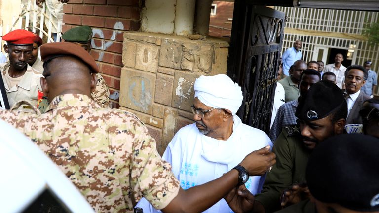 Sudan's ex-president Omar al Bashir leaves the office of the anti-corruption prosecutor