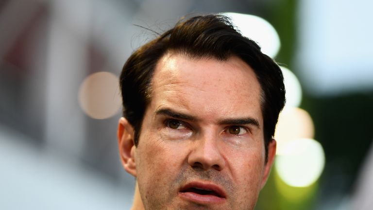 SINGAPORE - SEPTEMBER 16:  British comedian Jimmy Carr looks on in the Paddock before the Formula One Grand Prix of Singapore at Marina Bay Street Circuit on September 16, 2018 in Singapore.  (Photo by Clive Mason/Getty Images)