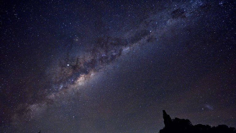 The Galactic Centers of the Milky Way, Jupiter (brightest point in the center left of the image) and the Small Magellanic Cloud (SMC) Galaxy (lower right) as seen late May 10, 2019 from the countryside of Uruguay in the province of Soriano, near the village of Andresito, department of Flores.  (Photo by Mariana SUAREZ / AFP) (Photo source should read MARIANA SUAREZ / AFP / Getty Images)