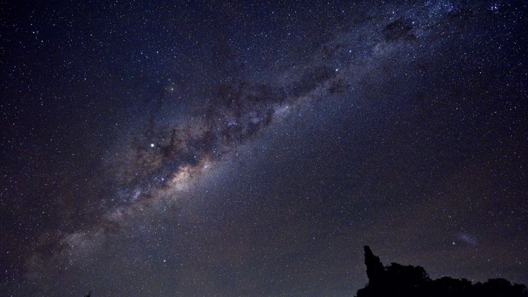 The Milky Way's Galactic Centre, Jupiter (brightest spot in the centre-left of the image) and the Small Magellanic Cloud (SMC) galaxy (right bottom corner) are seen late on May 10, 2019 from the Uruguayan countryside in the department of Soriano, near the village of Andresito, department of Flores. (Photo by Mariana SUAREZ / AFP)        (Photo credit should read MARIANA SUAREZ/AFP/Getty Images)