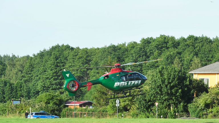 Police helicopter lands in the site where two Eurofighter warplanes crashed in Jabel, Germany, June 24, 2019. REUTERS/Fabian Bimmer