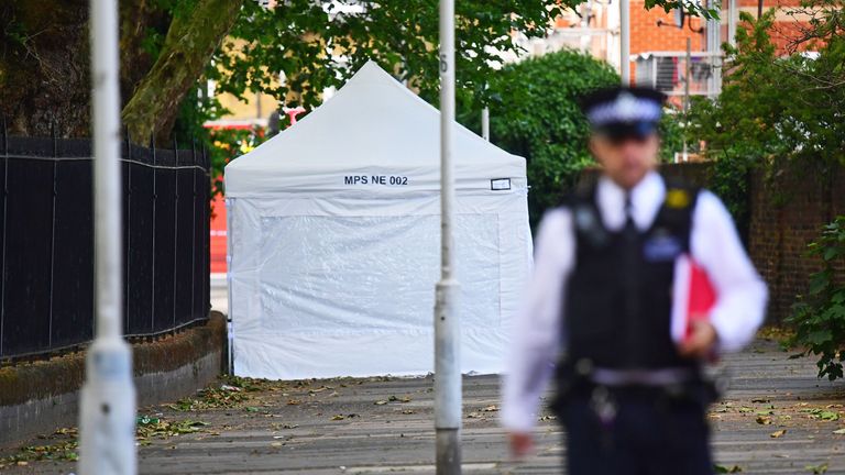A police forensic tent at the scene in Stratford, east London