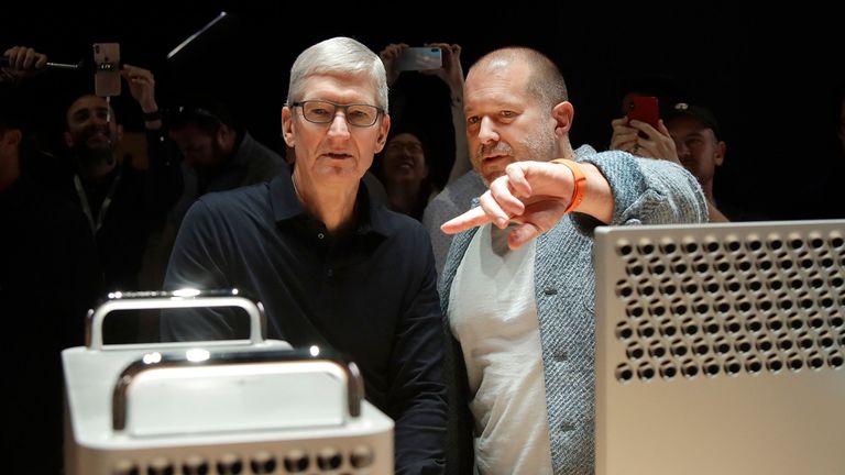 Apple CEO Tim Cook, left, and chief design officer Jonathan Ive look at the Mac Pro in the display room at the Apple Worldwide Developers Conference in San Jose, Calif., Monday, June 3, 2019. (AP Photo/Jeff Chiu)