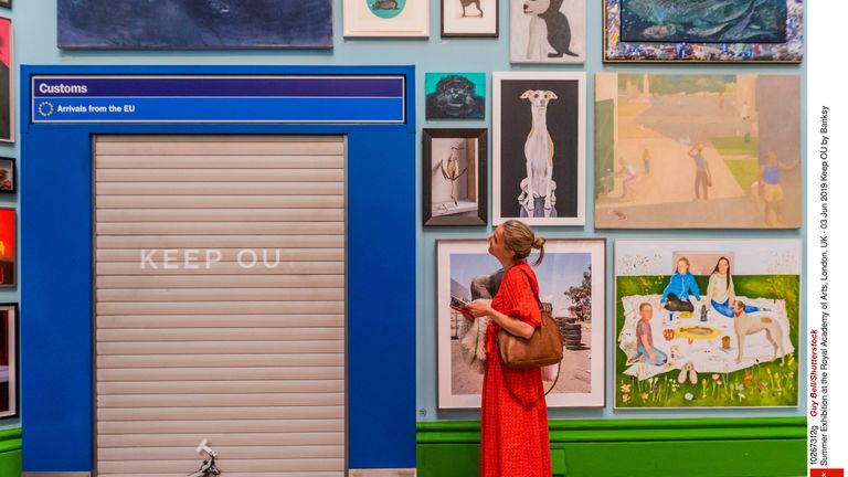 Keep OU by Banksy, from Summer Exhibition at the Royal Academy of Arts, London Pic: Guy Bell/Shutterstock