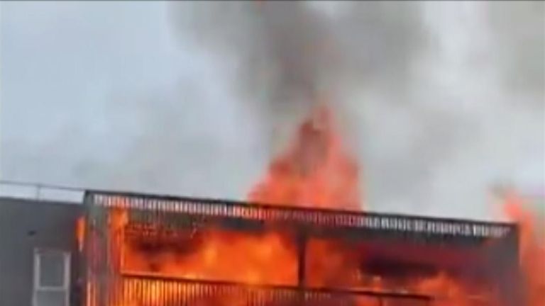 About 100 firefighters have been tackling a fire at a block of flats in east London.
