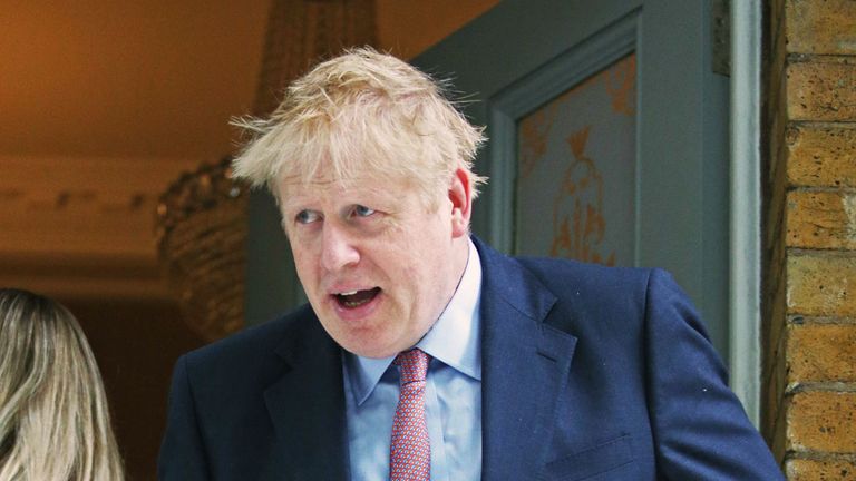 Boris Johnson leaves his home