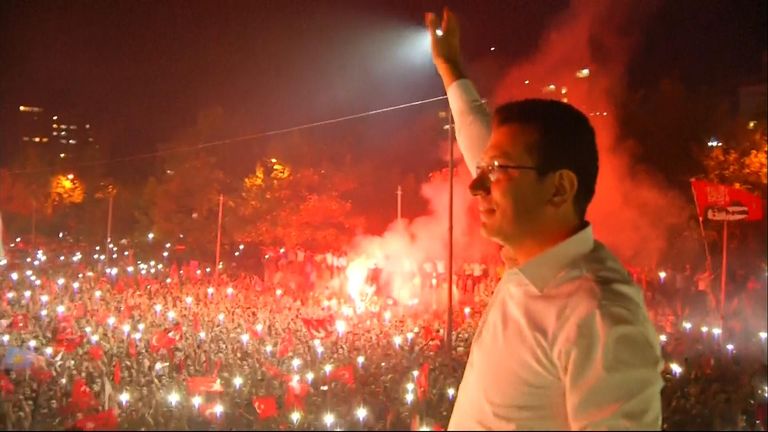 Ekrem Imamoglu greets supporters after his election win