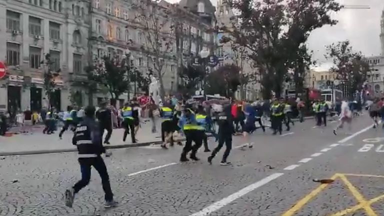 Police and England fans clashing in the Portuguese city of Porto 