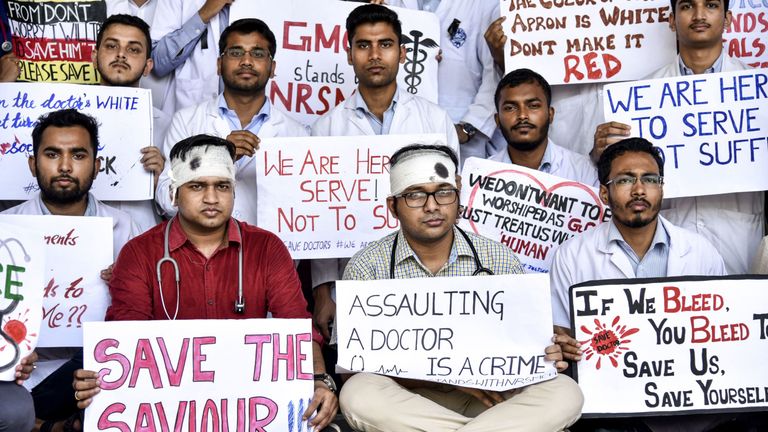 Indian students and doctors stage a silent protest during the nationwide strike