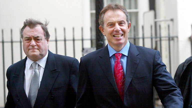 Former deputy PM John Prescott (L) walks with former British PM Tony Blair on Downing Street in 2004