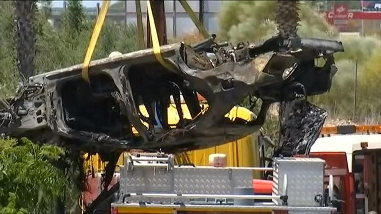 Wreckage being removed from the crash site