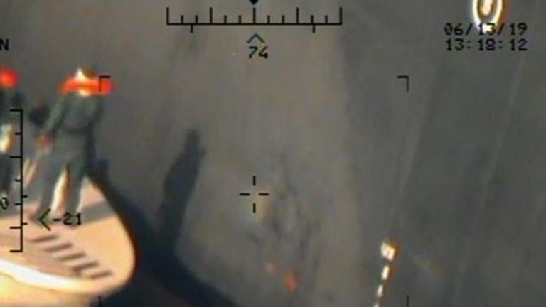 What the US says are members of the Islamic Revolutionary Guard Corps Navy leaving after removing an unexploded limpet mine from the M/T Kokuka Courageous