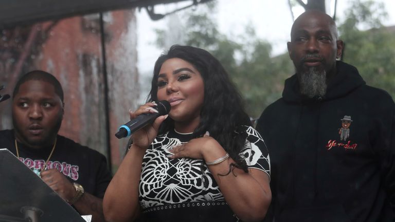 Rap singer Lil&#39; Kim speaks at the street naming ceremony for Christopher "Notorious B.I.G" Wallace way in the Brooklyn borough of New York, U.S., June 10, 2019. REUTERS/Shannon Stapleton