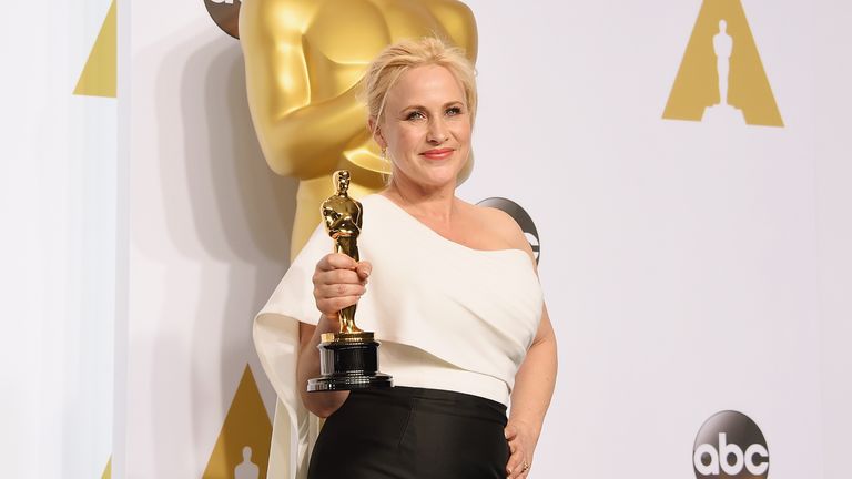 Patricia Arquette poses with her Oscar for best supporting actress for Boyhood in the press room during the 87th Annual Academy Awards at Loews Hollywood Hotel on February 22, 2015