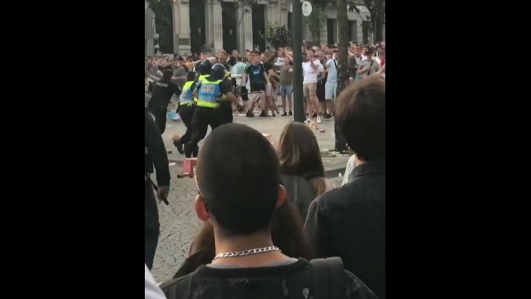 Police and England fans clash in Porto