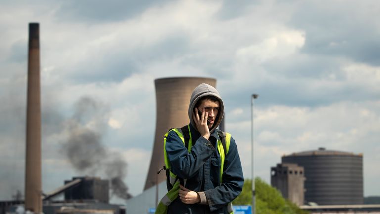 Workers leave the steelworks plant in Scunthorpe 