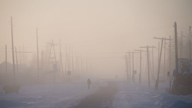 A main street of the settlement of Oy, in Siberia