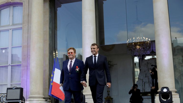 The French President described Sir Elton as 'an icon that knew how to set an example'