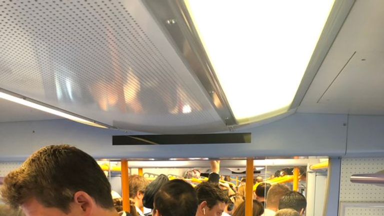 Rail strike: Passengers hit by travel chaos with huge queues and rammed ...