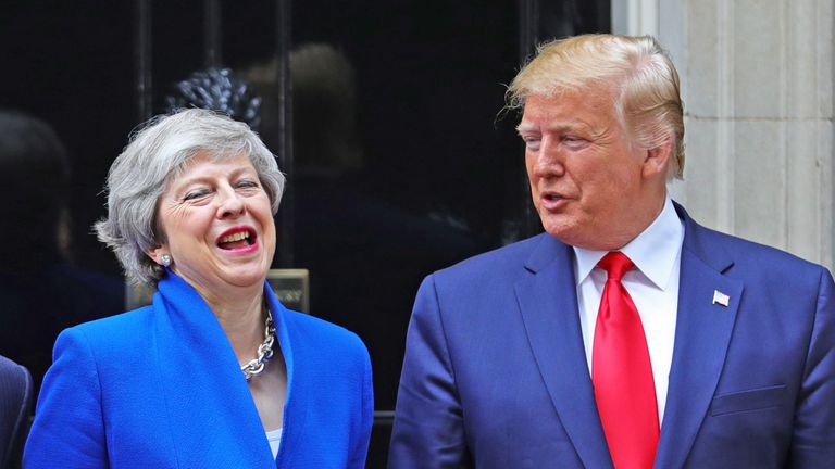 Theresa May and Donald Trump share a joke outside No10