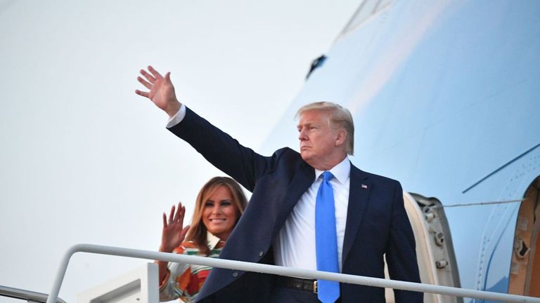 The president and his wife wave as they boarded Air Force One for the flight across the Atlantic