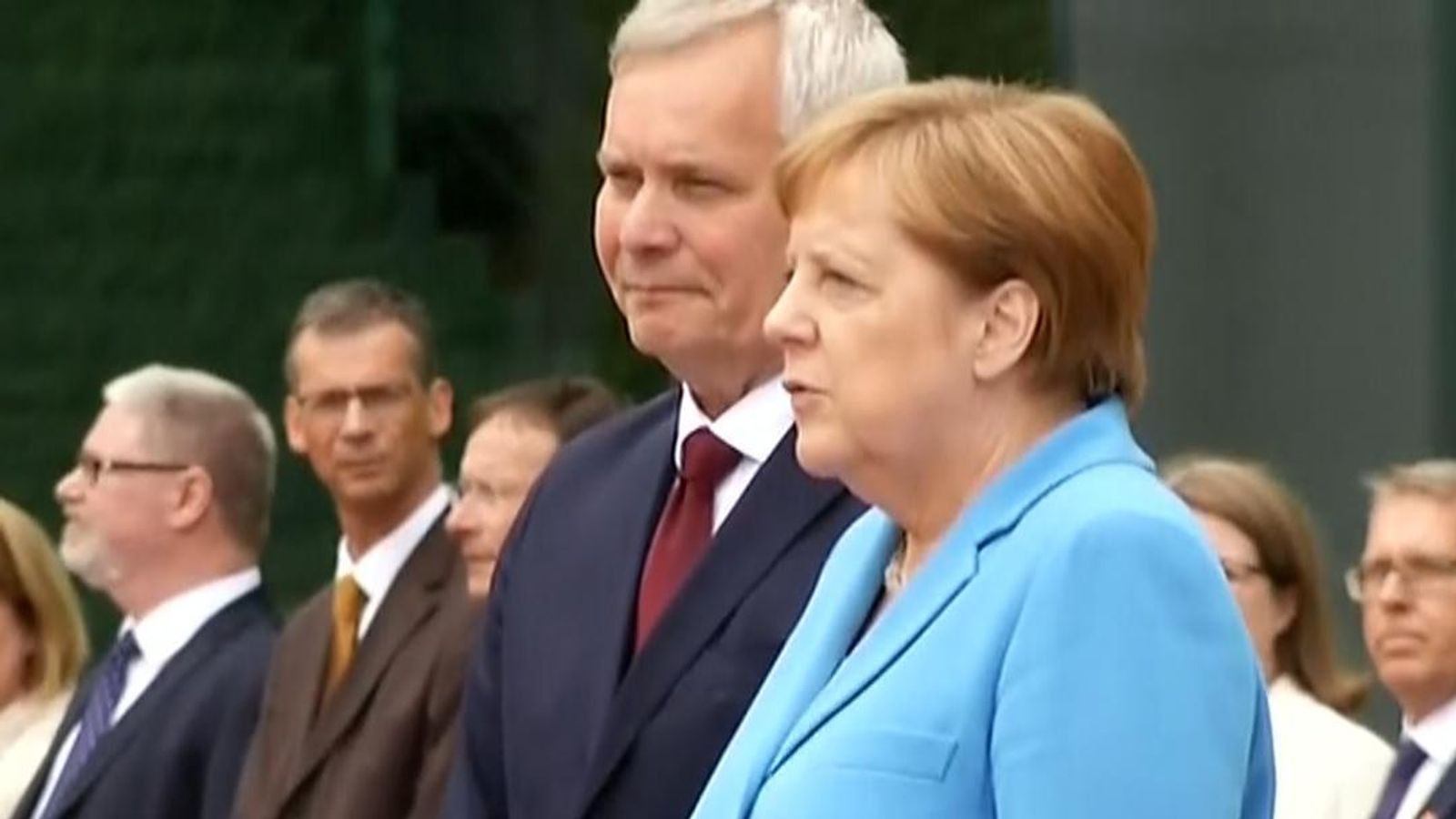 German chancellor Angela Merkel shakes during visit by Finnish PM