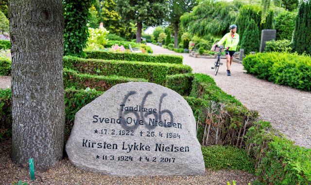 Vandals spray paint graves in Denmark with Satanic '666' graffiti