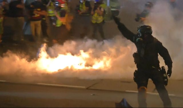 Hong Kong: Tear gas fired as police and protesters clash