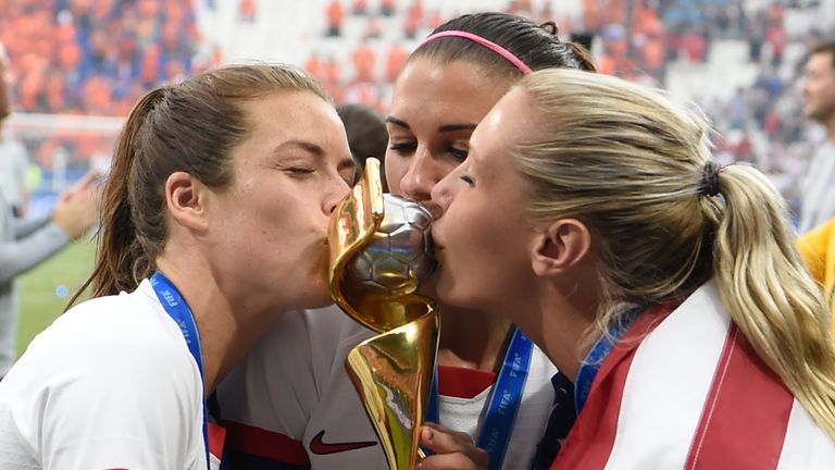 USA's players kiss the trophy after the France 2019 Womens World Cup football final match between USA and the Netherlands, on July 7, 2019, at the Lyon Stadium in Lyon, central-eastern France. (Photo by Philippe DESMAZES / AFP)        (Photo credit should read PHILIPPE DESMAZES/AFP/Getty Images)