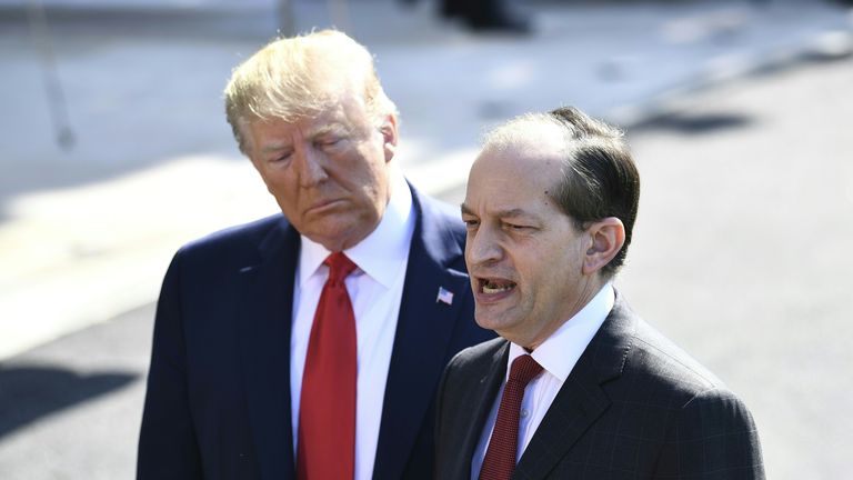 US President Donald Trump (L) listens to US Labor Secretary Alexander Acosta as he speaks to the media early July 12, 2019 at the White House in Washington, DC. - Acosta announced his resignation over the Jeffrey Epstein affair. (Photo by Brendan Smialowski / AFP)        (Photo credit should read BRENDAN SMIALOWSKI/AFP/Getty Images)