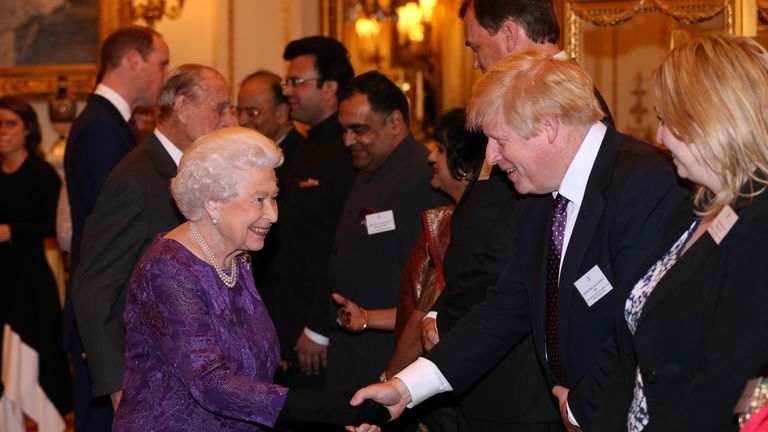 LONDON, ENGLAND - FEBRUARY 27:  Queen Elizabeth II greets Foreign Secretary Boris Johnson at a reception this evening to mark the launch of the UK-India Year of Culture 2017 on February 27, 2017 in London, England. (Photo by Jonathan Brady - WPA Pool/Getty Images)