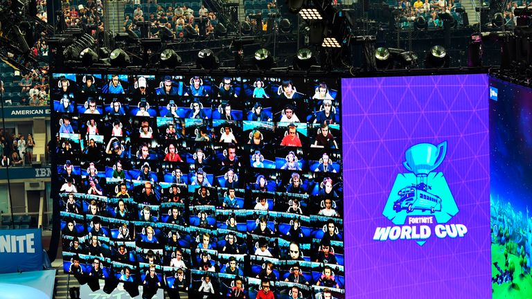 Players are seen on screen during the final of the Solo competition at the 2019 Fortnite World Cup July 28, 2019 inside of Arthur Ashe Stadium, in New York City. (Photo by Johannes EISELE / AFP)        (Photo credit should read JOHANNES EISELE/AFP/Getty Images)