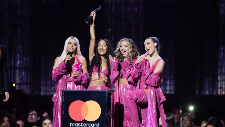 LONDON, ENGLAND - FEBRUARY 20: (EDITORIAL USE ONLY) Jade Thirlwall, Leigh-Anne Pinnock, Perrie Edwards and Jesy Nelson of Little Mix win Best British Artist Video of the Year award during The BRIT Awards 2019 held at The O2 Arena on February 20, 2019 in London, England. (Photo by Samir Hussein/WireImage)