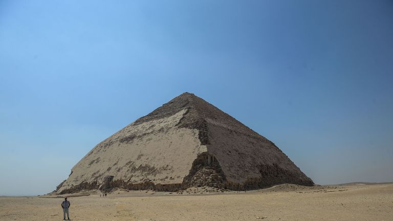 A picture taken on July 13, 2019 shows the Bent pyramid of King Sneferu, the first pharaoh of Egypt's 4th dynasty, in the ancient royal necropolis of Dahshur on the west bank of the Nile River, south of the capital Cairo