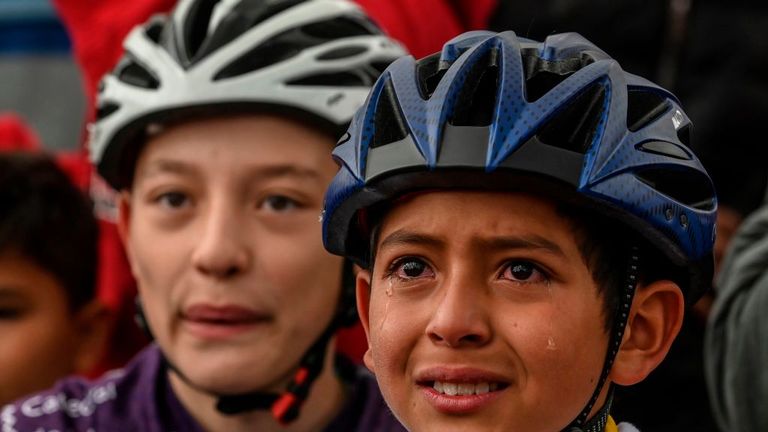 A boy cries as he celebrates while watching the Tour de France in Zipaquira -Colombian cyclist Egan Bernal&#39;s hometown