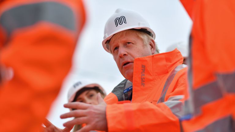 Britain&#39;s Prime Minister Boris Johnson meets engineering graduates on the site of an under-construction tramline in Stretford, greater Manchester, northwest England on July 27, 2019, prior to giving a speech focusing on domestic priorities. (Photo by Ben STANSALL / various sources / AFP) (Photo credit should read BEN STANSALL/AFP/Getty Images)